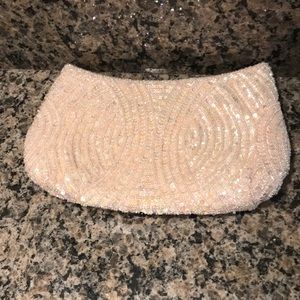 Small pink sequin clutch